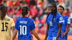 France's defender Griedge Mbock Bathy (R) celebrates with teammates after scoring her team second goal during the UEFA Women's Euro 2022 Group D football match between France and Belgium at New York Stadium in Rotherham, northern England on July 14, 2022. (Photo by FRANCK FIFE / AFP) / No use as moving pictures or quasi-video streaming. 
Photos must therefore be posted with an interval of at least 20 seconds.