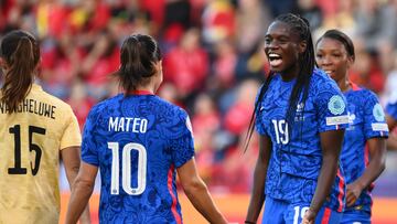 France's defender Griedge Mbock Bathy (R) celebrates with teammates after scoring her team second goal during the UEFA Women's Euro 2022 Group D football match between France and Belgium at New York Stadium in Rotherham, northern England on July 14, 2022. (Photo by FRANCK FIFE / AFP) / No use as moving pictures or quasi-video streaming. 
Photos must therefore be posted with an interval of at least 20 seconds.