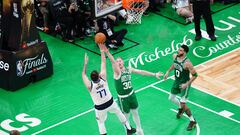 Jun 17, 2024; Boston, Massachusetts, USA; Dallas Mavericks guard Luka Doncic (77) shoots against Boston Celtics forward Sam Hauser (30) in the second half during game five of the 2024 NBA Finals at TD Garden. Mandatory Credit: David Butler II-USA TODAY Sports