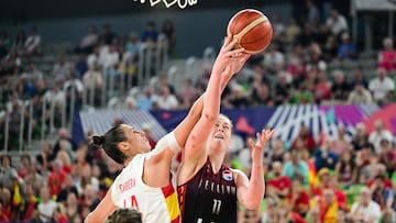 Belgium's power forward Emma Meesseman (R) fights for the ball with Spain's center Raquel Carrera (L) during the FIBA Women's Eurobasket 2023 final basketball match between Spain and Belgium at the Arena Stozice in Ljubljana, Slovenia, on June 25, 2023. (Photo by Jure Makovec / AFP)