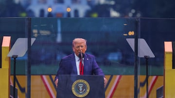 U.S. President Donald Trump speaks as he attends a military parade to commemorate the U.S. Army's 250th Birthday, on the day of his 79th birthday, in Washington, D.C., U.S., June 14, 2025. REUTERS/Carlos Barria