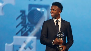 Brazilian forward Vinicius Junior poses with the Best Player trophy during the Best FIFA Football Awards 2024 ceremony in Doha