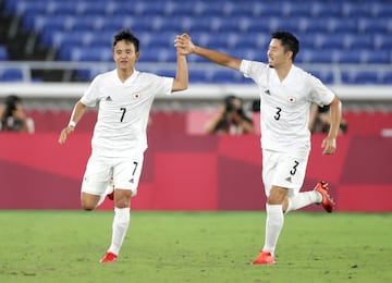 Kubo celebrates with Yuta Nakayama