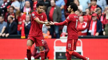 Liverpool (United Kingdom), 22/05/2022.- Mohamed Salah (R) of Liverpool is congratulated by teammate Luis Diaz after giving his team the 2-1 lead during the English Premier League soccer match between Liverpool FC and Wolverhampton Wanderers in Liverpool, Britain, 22 May 2022. (Reino Unido) EFE/EPA/PETER POWELL EDITORIAL USE ONLY. No use with unauthorized audio, video, data, fixture lists, club/league logos or 'live' services. Online in-match use limited to 120 images, no video emulation. No use in betting, games or single club/league/player publications