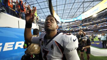 INGLEWOOD, CALIFORNIA - DECEMBER 10: Russell Wilson #3 of the Denver Broncos reacts as he leaves the field after the game against the Los Angeles Chargers at SoFi Stadium on December 10, 2023 in Inglewood, California.   Harry How/Getty Images/AFP (Photo by Harry How / GETTY IMAGES NORTH AMERICA / Getty Images via AFP)