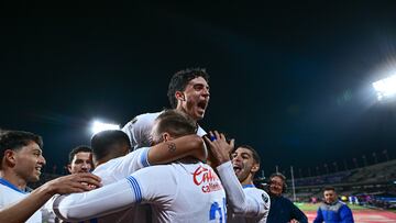 Angel Sepulveda celebrates his goal 0-1 with Lorenzo Faravelli of Cruz Azul during the 14th round match between Pumas UNAM and Cruz Azul as part of the Liga BBVA MX, Torneo Apertura 2024 at Olimpico Universitario Stadium on October 26, 2024 in Mexico City, Mexico.