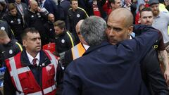 Pep Guardiola and José Mourinho give the world a hug