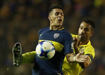 Mario Gaspar y Cristian Pavón.