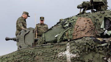 Russian Defence Minister Sergei Shoigu inspects a Swedish CV-90 infantry fighting vehicle, that was abandoned by Ukrainian soldiers after being hit by a hand-held anti-tank grenade, at the frontline headquarters of the "Centre" army group involved in Russia-Ukraine conflict, at an unknown location, in this picture released August 4, 2023. Russian Defence Ministry/Handout via REUTERS ATTENTION EDITORS - THIS IMAGE WAS PROVIDED BY A THIRD PARTY. NO RESALES. NO ARCHIVES. MANDATORY CREDIT.