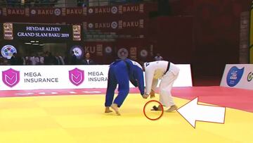 Judo fighter disqualified... after his mobile phone falls out!