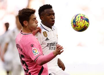 Soccer Football - LaLiga - Real Madrid v Espanyol - Santiago Bernabeu, Madrid, Spain - March 11, 2023 Real Madrid's Vinicius Junior in action with Espanyol's Jose Gragera REUTERS/Juan Medina