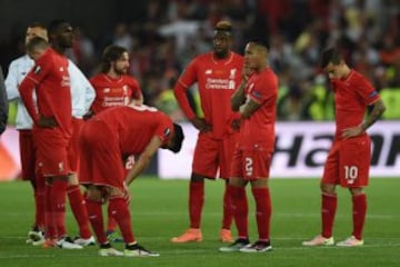 Liverpool's players, distraught at full time.