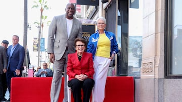 US actress Jamie Lee Curtis (R) and US former basketball player Magic Johnson (L) pose alongside US former tennis player and activist Billie Jean King during the ceremony honoring her with a Star on the Hollywood Walk of Fame on April 7, 2025, in Hollywood, California. (Photo by VALERIE MACON / AFP)