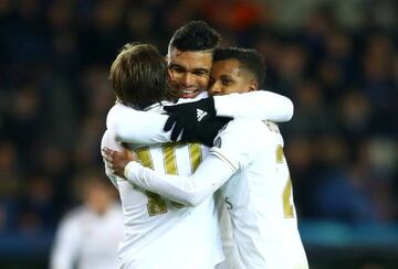 Casemiro, seen here celebrating with Luka Modric and Rodrygo Goes in the win over Club Brugge, has been nigh-on ever-present for Real Madrid this season.