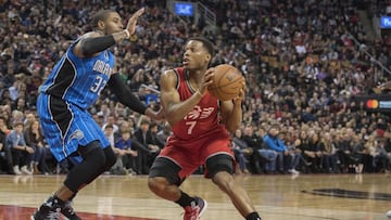 Jan 29, 2017; Toronto, Ontario, CAN; Toronto Raptors guard Kyle Lowry (7) controls a ball as Orlando Magic guard C.J. Watson (32) defends during the fourth quarter in a game at Air Canada Centre. The Orlando Magic won 114-113. Mandatory Credit: Nick Turchiaro-USA TODAY Sports