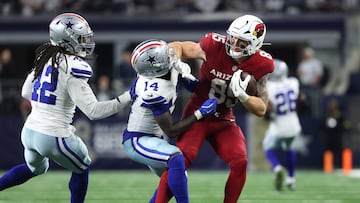 Nov 3, 2025; Arlington, Texas, USA; Arizona Cardinals tight end Trey McBride (85) runs against Dallas Cowboys safety Markquese Bell (14) in the second half at AT&T Stadium. Mandatory Credit: Kevin Jairaj-Imagn Images