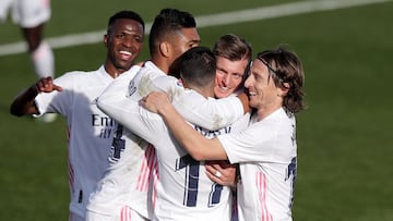 MADRID, SPAIN - FEBRUARY 14: Toni Kroos of Real Madrid celebrates with Vinicius Junior, Casemiro, Lucas Vazquez and Luka Modric after scoring their team's second goal during the La Liga Santander match between Real Madrid and Valencia CF at Estadio Alfred