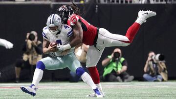 Nov 12, 2017; Atlanta, GA, USA; Dallas Cowboys quarterback Dak Prescott (4) is sacked by Atlanta Falcons defensive end Adrian Clayborn (99) in the fourth quarter at Mercedes-Benz Stadium. Mandatory Credit: Jason Getz-USA TODAY Sports