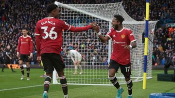Soccer Football - Premier League - Leeds United v Manchester United - Elland Road, Leeds, Britain - February 20, 2022 Manchester United's Fred celebrates scoring their third goal with Anthony Elanga Action Images via Reuters/Lee Smith EDITORIAL USE O