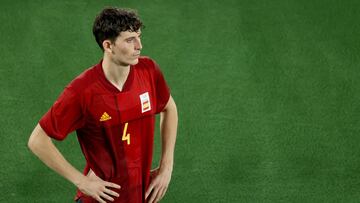 YOKOHAMA, JAPAN - AUGUST 07: Pau Torres #4 of Team Spain looks dejected following defeat in the Men's Gold Medal Match between Brazil and Spain on day fifteen of the Tokyo 2020 Olympic Games at International Stadium Yokohama on August 07, 2021 in Yok