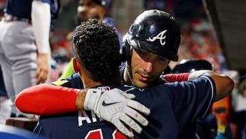 PHILADELPHIA, PENNSYLVANIA - SEPTEMBER 11: Matt Olson #28 of the Atlanta Braves is hugged by Orlando Arcia #11 after hitting a three-run home run against the Philadelphia Phillies during the third of game two of a doubleheader at Citizens Bank Park on September 11, 2023 in Philadelphia, Pennsylvania. Rich Schultz/Getty Images/AFP (Photo by Rich Schultz / GETTY IMAGES NORTH AMERICA / Getty Images via AFP)