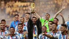 FILE PHOTO: Soccer Football - FIFA World Cup Qatar 2022 - Final - Argentina v France - Lusail Stadium, Lusail, Qatar - December 18, 2022 Argentina's Lionel Messi lifts the World Cup trophy alongside teammates as they celebrate winning the World Cup  REUTERS/Carl Recine/File Photo