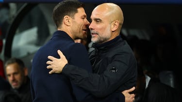 Soccer Football - UEFA Champions League - Real Madrid v Manchester City - Santiago Bernabeu, Madrid, Spain - December 10, 2025 Real Madrid coach Xabi Alonso and Manchester City manager Pep Guardiola before the match REUTERS/Susana Vera