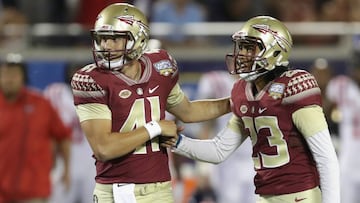 ORLANDO, FL - SEPTEMBER 05: Ricky Aguayo #23 of the Florida State Seminoles (R) reacts after making a field goal in the second half against the Mississippi Rebels during the Camping World Kickoff at Camping World Stadium on September 5, 2016 in Orlando, Florida.   Streeter Lecka/Getty Images/AFP
 == FOR NEWSPAPERS, INTERNET, TELCOS &amp; TELEVISION USE ONLY ==