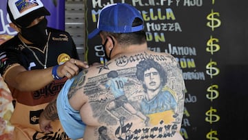 A Diego Maradona shrine takes over a fan's back