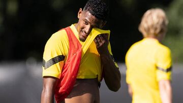 15 July 2022, Switzerland, Bad Ragaz: Soccer: Bundesliga, Borussia Dortmund training camp. Sebastien Haller wipes the sweat from his face. Photo: Marco Steinbrenner/dpa (Photo by Marco Steinbrenner/picture alliance via Getty Images)