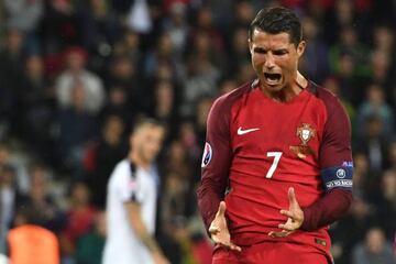 Portugal's forward Cristiano Ronaldo reacts after missing an opportunity