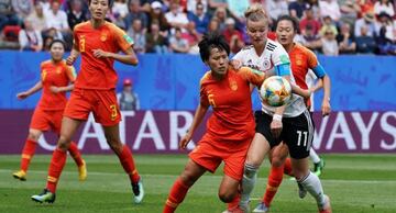 Jugadoras de China y Alemania durante un partido del Mundial.