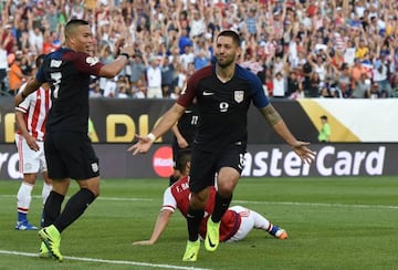 Dempsey celebrates after hitting the USA's winner against Paraguay.