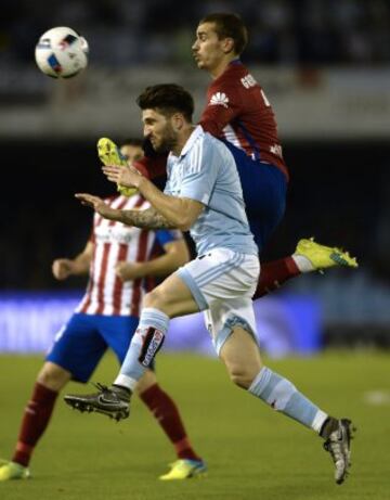 Carles Planas y Antoine Griezmann.