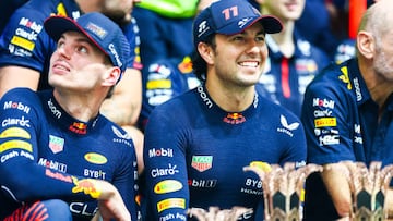 JEDDAH, SAUDI ARABIA - MARCH 19: Race winner Sergio Perez of Mexico and Oracle Red Bull Racing, Second placed Max Verstappen of the Netherlands and Oracle Red Bull Racing and the Red Bull Racing team celebrate after the F1 Grand Prix of Saudi Arabia at Jeddah Corniche Circuit on March 19, 2023 in Jeddah, Saudi Arabia. (Photo by Dan Istitene - Formula 1/Formula 1 via Getty Images)