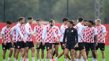 Girona's players and Spanish coach Michel (C) take part in a training session on the eve of the UEFA Champions League football match between PSV Eindhoven and Girona, at Puma Academy training ground in Girona on November 4, 2024. (Photo by Josep LAGO / AFP)