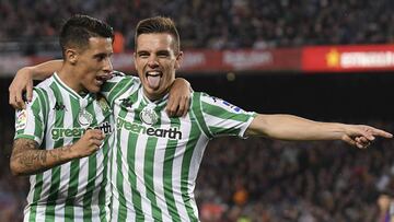 Giovani Lo Celso of Real Betis celebrates his goal with Cristian Tello during the match between FC Barcelona v Real Betis of LaLiga, date 11, 2018-2019 season. Camp Nou Stadium. Barcelona, Spain - 11 NOV 2018.