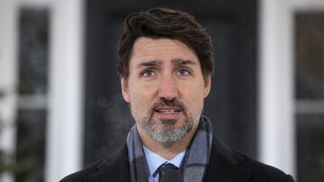 (FILES) In this file photo Canadian Prime Minister Justin Trudeau speaks during a news conference on COVID-19 situation in Canada from his residence in Ottawa, Canada on March 23, 2020. - Canadian Prime Minister Justin Trudeau said he did not know if he w