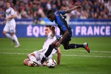 Blaise Matuidi and Mats Hummels in last night's controversial penalty call during the UEFA Nations League football match between France and Germany in Paris.