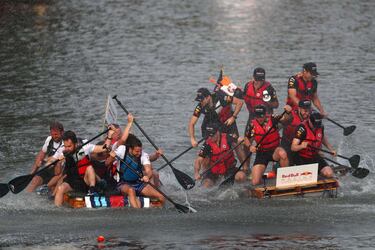 MONTREAL, QC - JUNE 10: Red Bull Racing Team Principal Christian Horner and the Red Bull Racing team battle with the Williams team on the water at the raft race after qualifying for the Canadian Formula One Grand Prix at Circuit Gilles Villeneuve on June 10, 2017 in Montreal, Canada.   Dan Istitene/Getty Images/AFP
== FOR NEWSPAPERS, INTERNET, TELCOS & TELEVISION USE ONLY ==