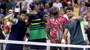 Miami Heat star Jimmy Butler served as honorary ball boy at a U.S. Open charity event, but took to the court and stole a point off No. 1 Carlos Alcaraz.