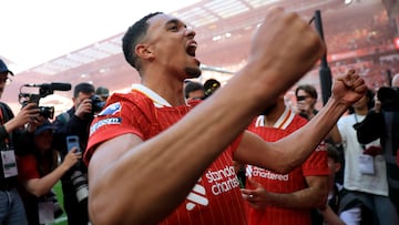LIVERPOOL, ENGLAND - APRIL 27: Trent Alexander-Arnold of Liverpool celebrates the teams victory and confirmation of winning the Premier League title after the Premier League match between Liverpool FC and Tottenham Hotspur FC at Anfield on April 27, 2025 in Liverpool, England. (Photo by Carl Recine/Getty Images)
