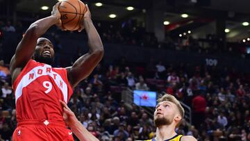 Jan 6, 2019; Toronto, Ontario, CAN; Toronto Raptors forward Serge Ibaka (9) drives to the basket over Indiana Pacers forward Domantas Sabonis (11) during the third quarter at Scotiabank Arena. Mandatory Credit: Nick Turchiaro-USA TODAY Sports