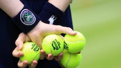 A ballboy holds a set of balls during Day One of The Championships Wimbledon 2022 at All England Lawn Tennis and Croquet Club on June 27, 2022 in London, England.