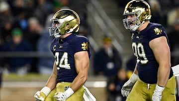 SOUTH BEND, INDIANA - NOVEMBER 16: Jack Kiser #24 of the Notre Dame Fighting Irish reacts after a sack in the second half against the Virginia Cavaliers at Notre Dame Stadium on November 16, 2024 in South Bend, Indiana. Quinn Harris/Getty Images/AFP (Photo by Quinn Harris / GETTY IMAGES NORTH AMERICA / Getty Images via AFP)