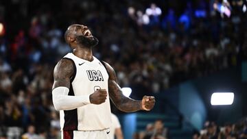 USA's #06 LeBron James celebrates at the end of the men's semifinal basketball match between USA and Serbia during the Paris 2024 Olympic Games at the Bercy Arena in Paris on August 8, 2024. (Photo by Aris MESSINIS / AFP)