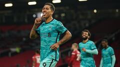MANCHESTER, ENGLAND - MAY 13: Roberto Firmino of Liverpool celebrates after scoring their side&#039;s second goal during the Premier League match between Manchester United and Liverpool at Old Trafford on May 13, 2021 in Manchester, England. Sporting stad