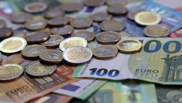 ILLUSTRATION - 15 May 2024, Bavaria, Kaufbeuren: ILLUSTRATION Various euro banknotes and euro coins lie on a table. Photo: Karl-Josef Hildenbrand/dpa (Photo by Karl-Josef Hildenbrand/picture alliance via Getty Images)