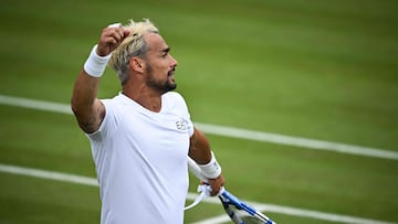 Italy's Fabio Fognini celebrates winning against Norway's Casper Ruud during their men's singles second round tennis match on the third day of the 2024 Wimbledon Championships at The All England Lawn Tennis and Croquet Club in Wimbledon, southwest London, on July 3, 2024. (Photo by Ben Stansall / AFP) / RESTRICTED TO EDITORIAL USE