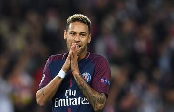 Brazilian forward Neymar reacting during the UEFA Champions League football match against Bayern Munich at the Parc des Princes stadium in Paris.